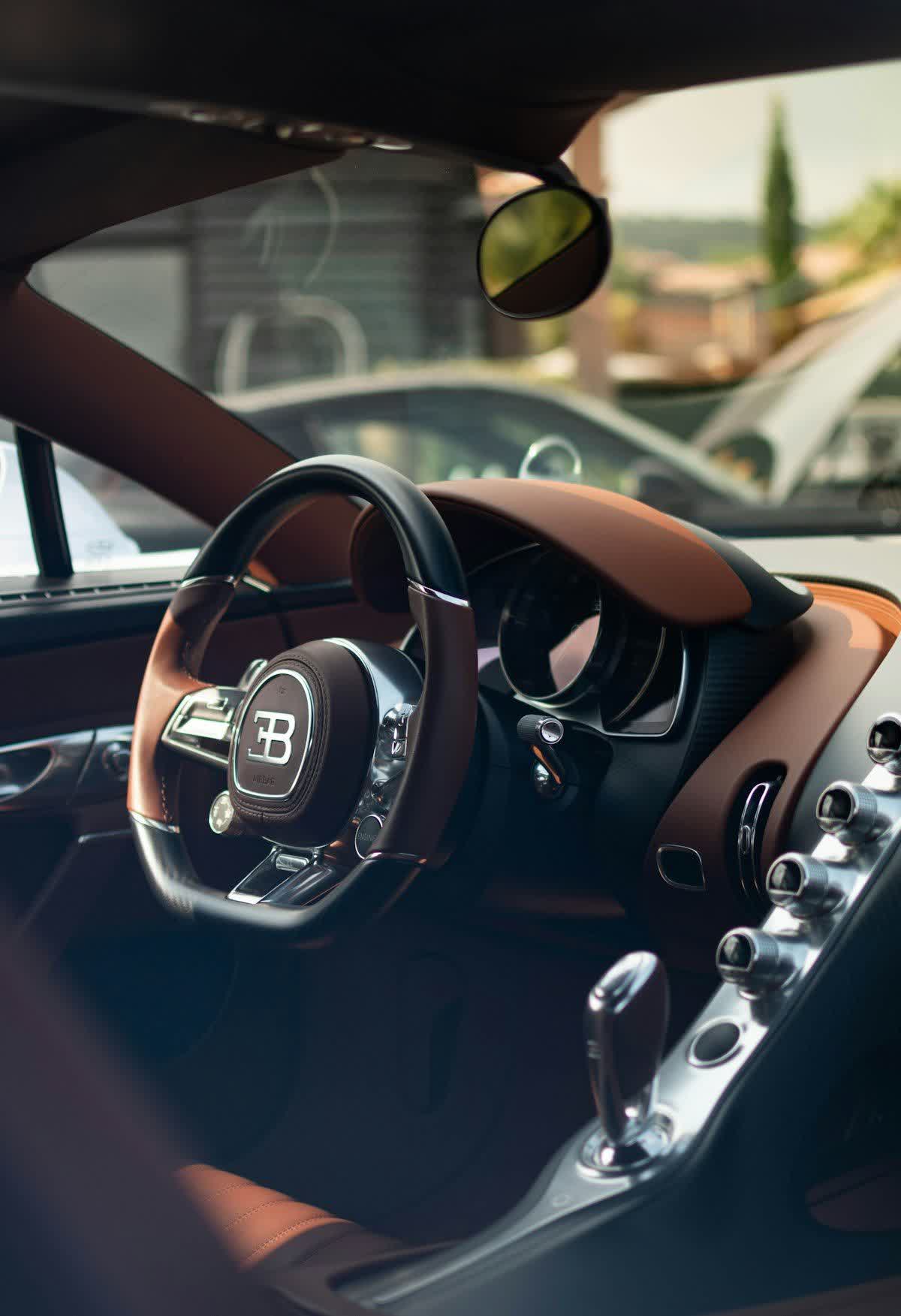 The cleaned cabin and steering wheel of a sports car